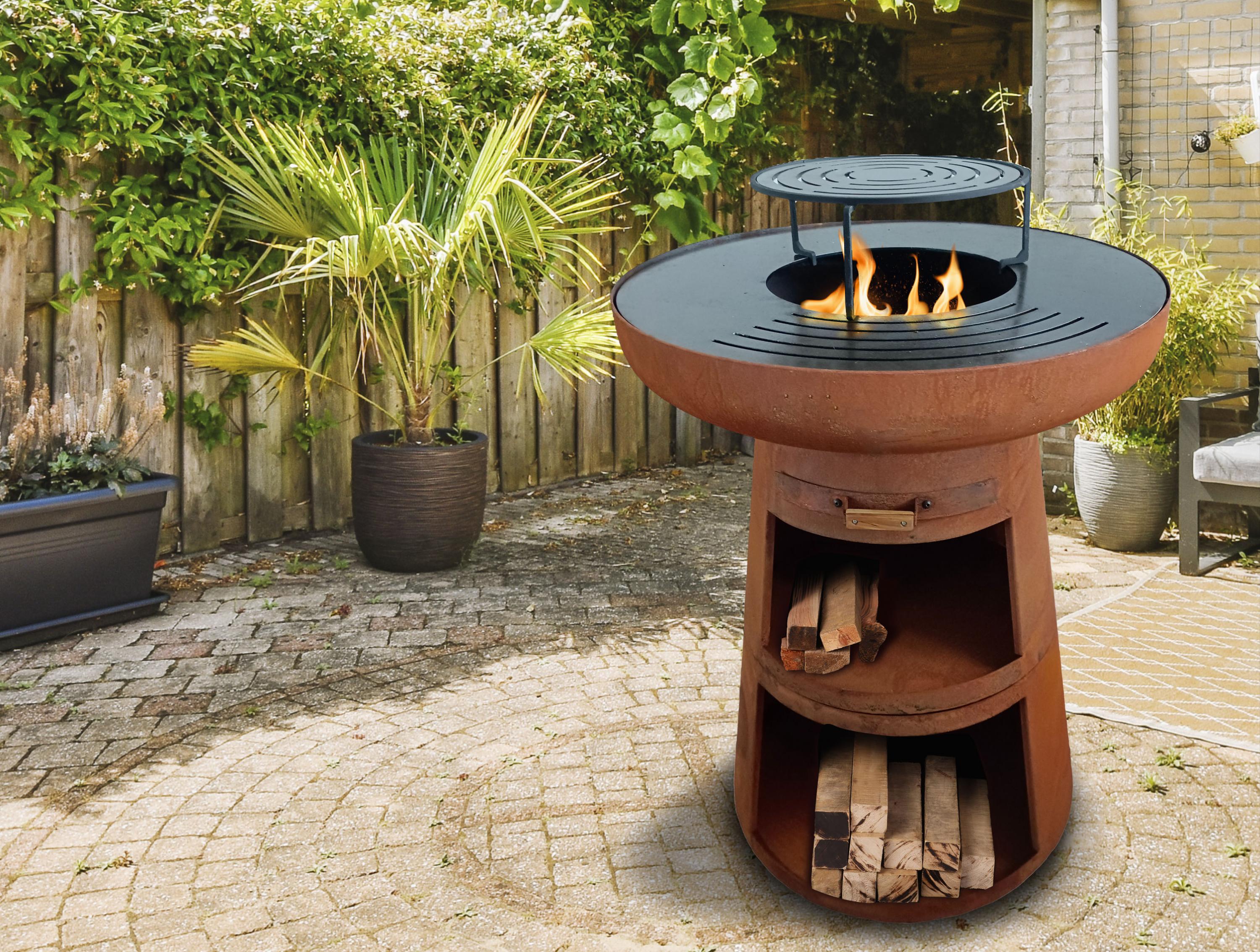 Barbecue rotondo con piastra rotonda in acciaio e griglia in acciaio corten
