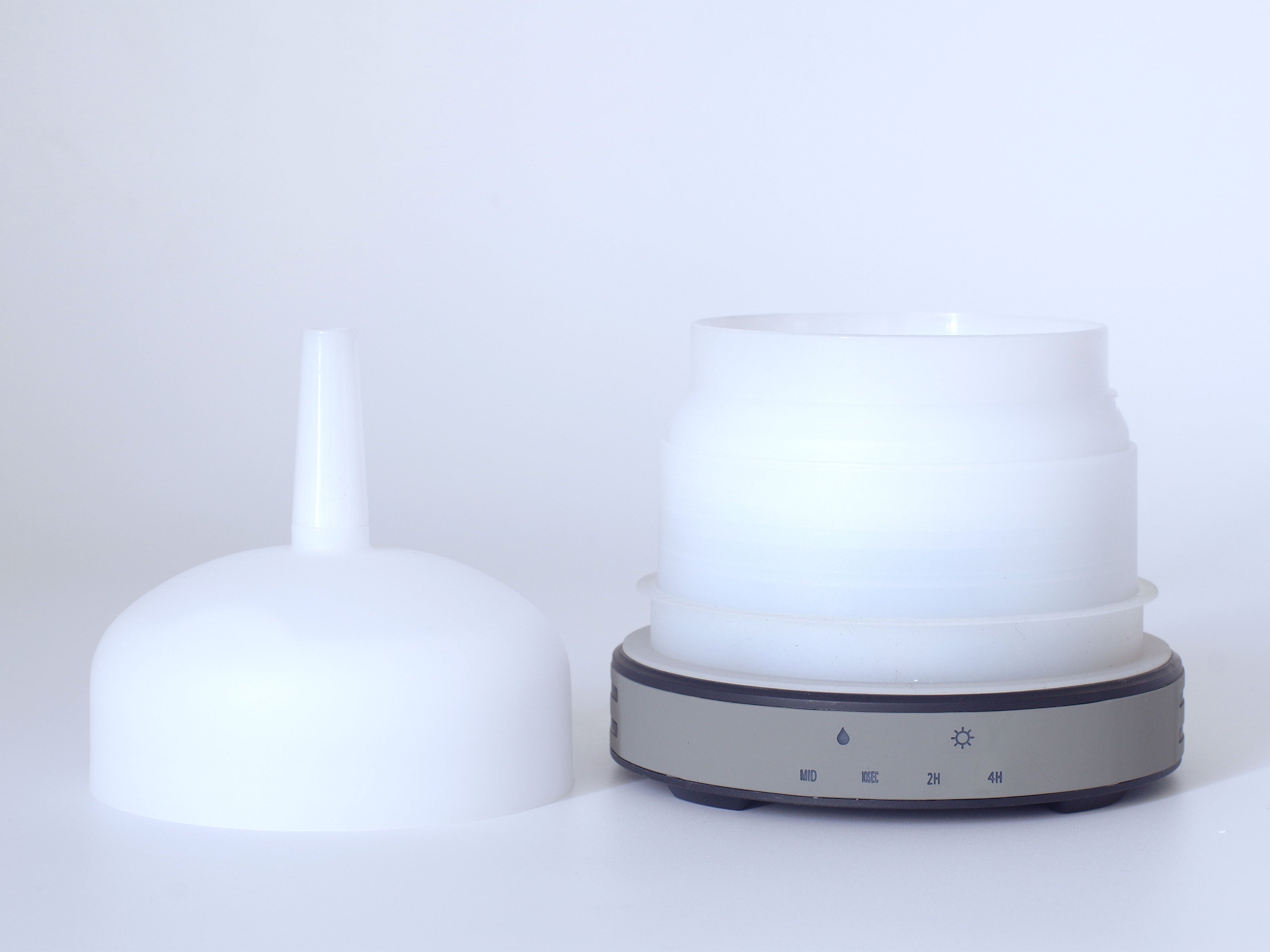 Diffusore di aromi in ceramica a forma di vaso con luce ambiente a LED