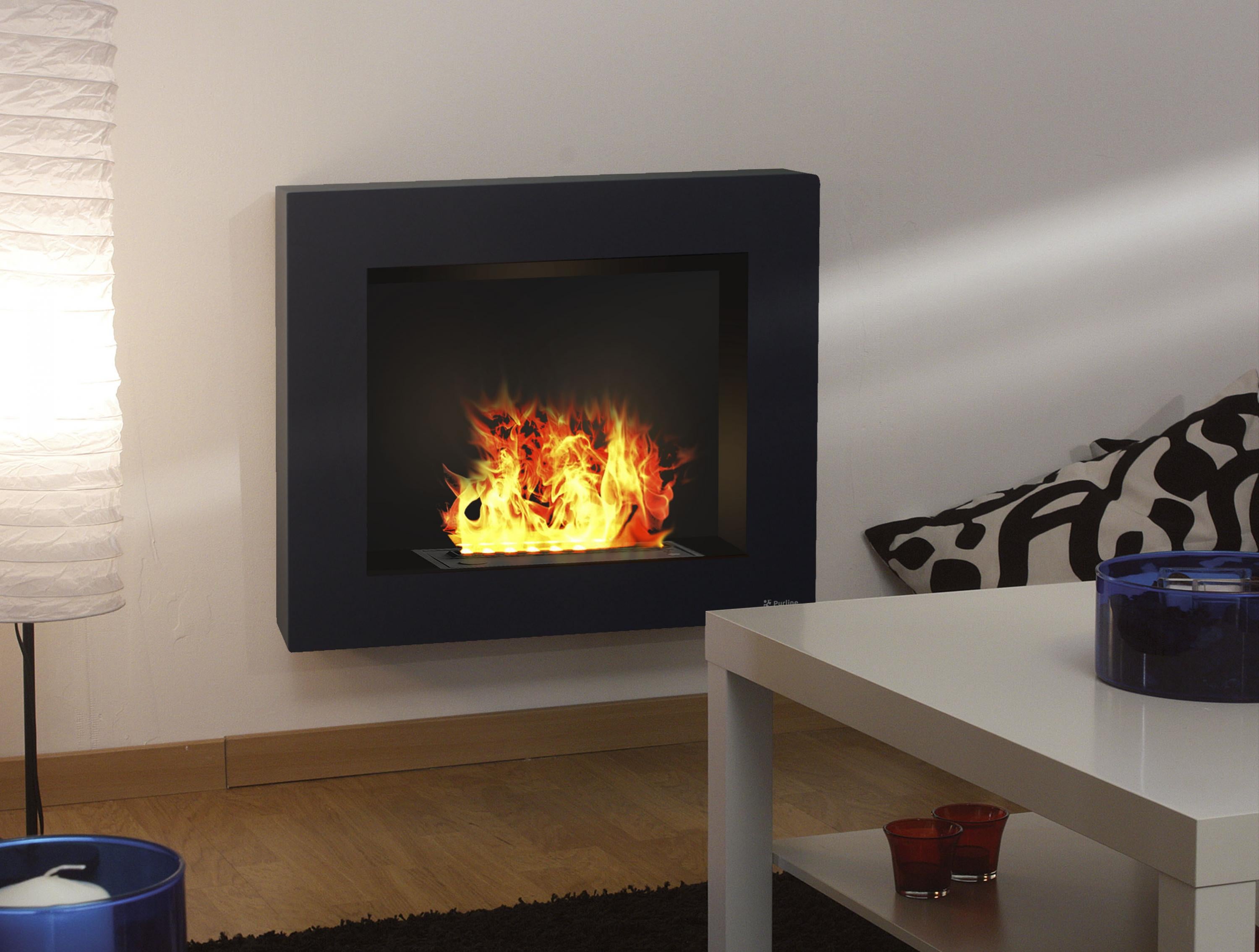 Camino decorativo a parete con fiamma simulata